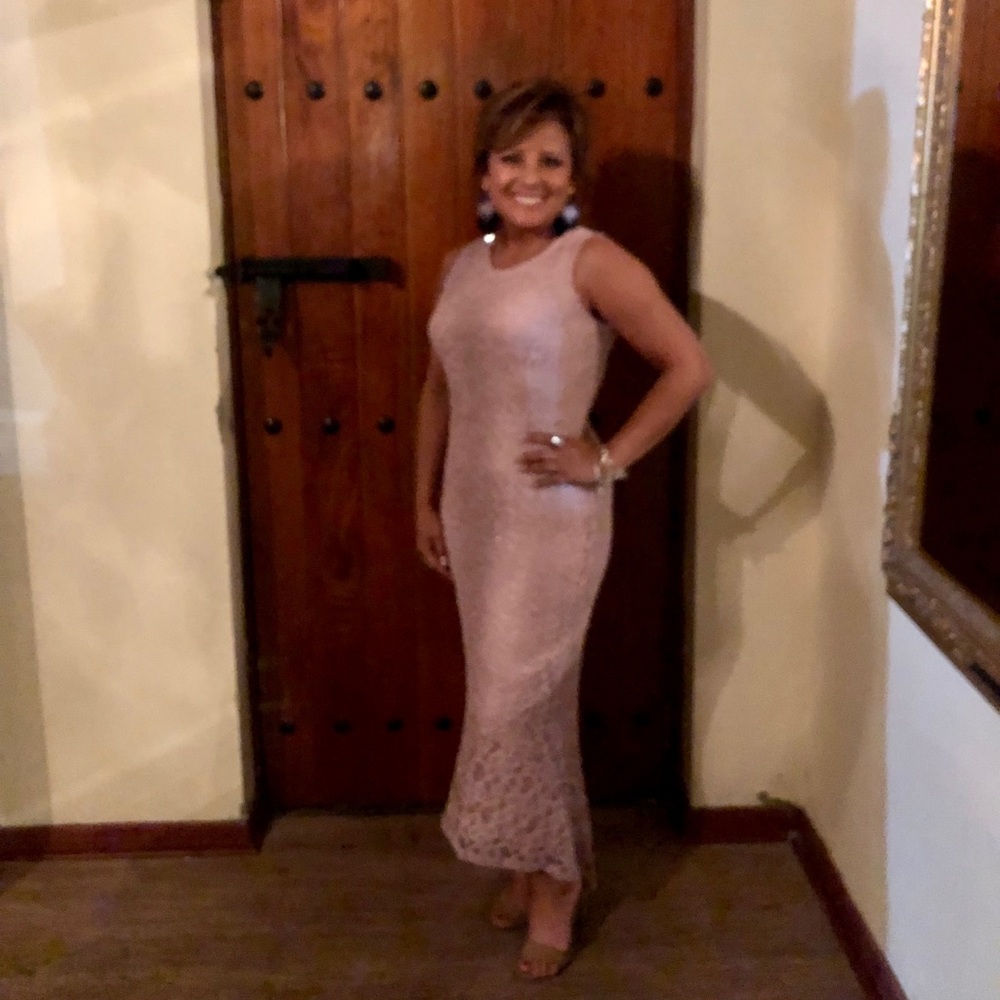 Rose color dress.
